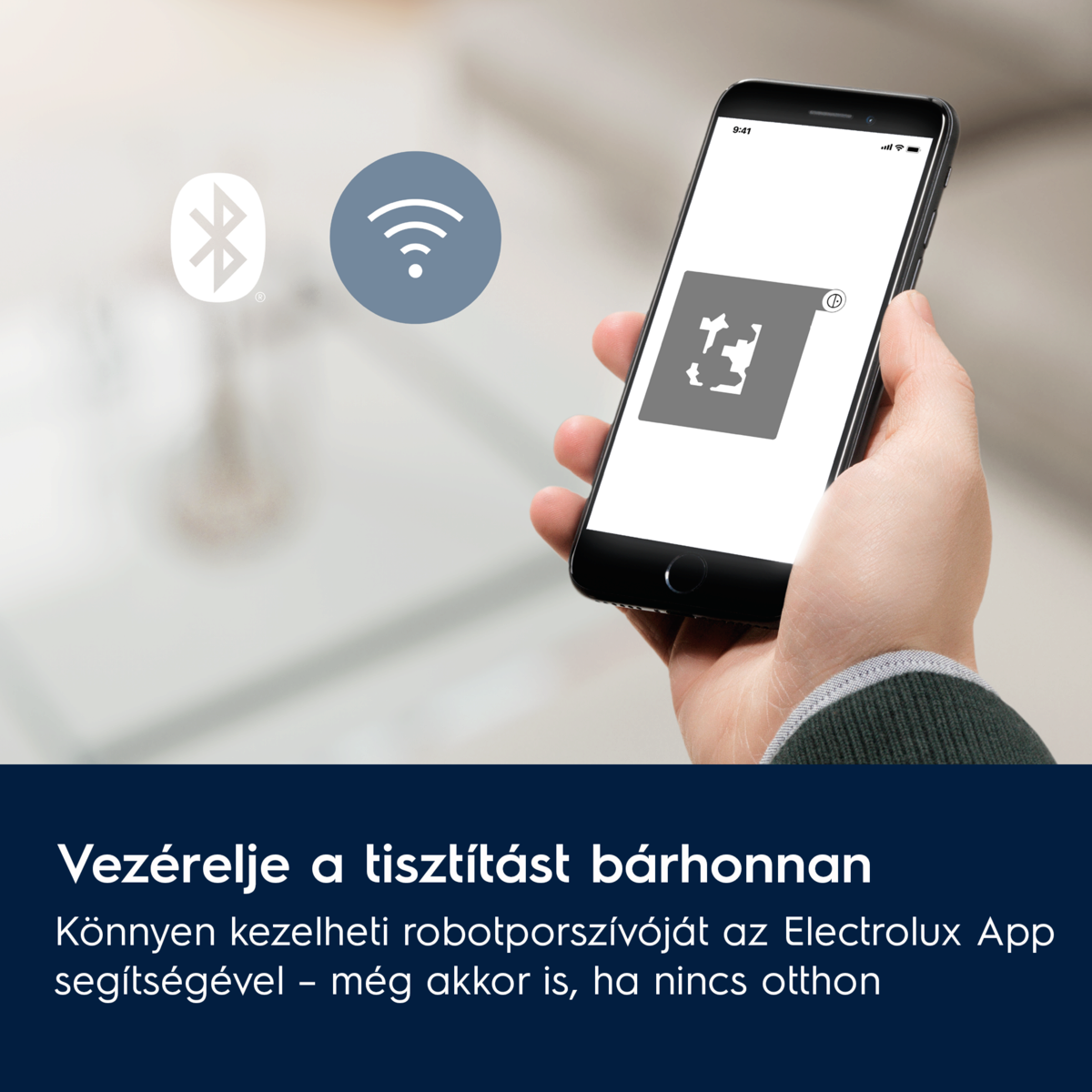 Egy kéz, amely egy térképet mutató telefont tart, Bluetooth és wifi ikonokkal. A szöveg így szól: Irányítsd a tisztítást bárhonnan.