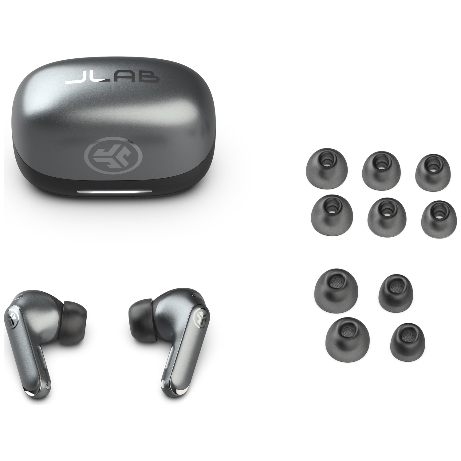 Image shows a charging case, earbuds, and ear tips. All items are gray. The case has 'JLab' on it. Earbuds are in pairs.