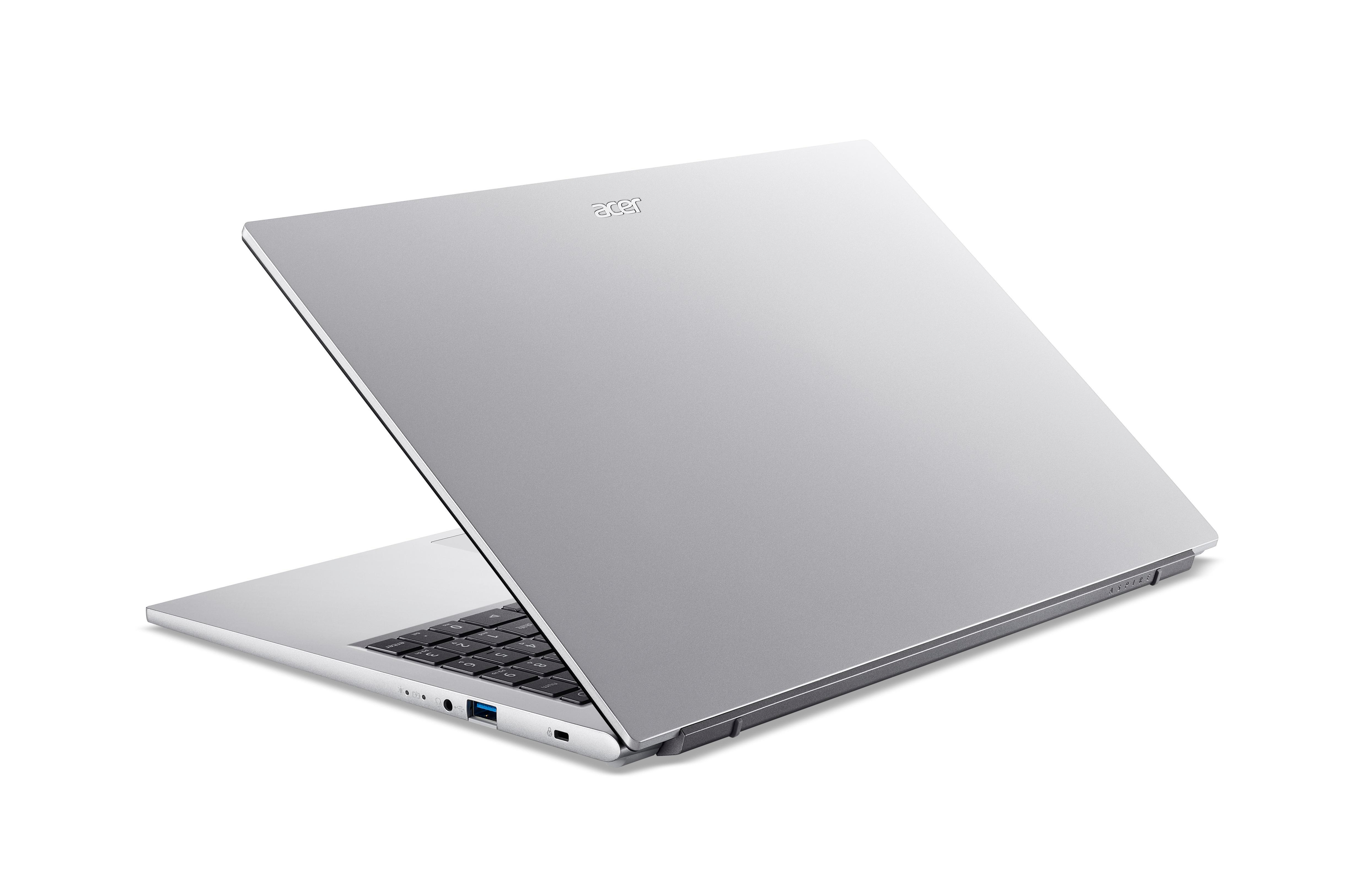 Silberner Acer-Laptop, geöffnet. Der Bildschirm ist hochgeklappt. Tastatur sichtbar. Der Hintergrund ist weiß.