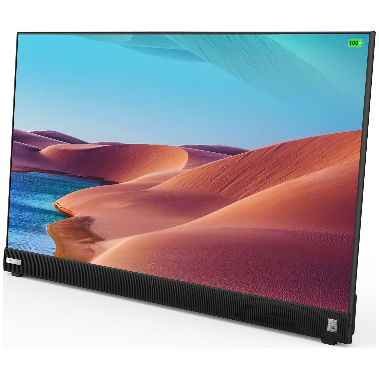 Een grote tv toont een woestijnlandschap met duinen en blauwe lucht. De tv heeft een zwarte luidspreker aan de onderkant en een JBL-logo.