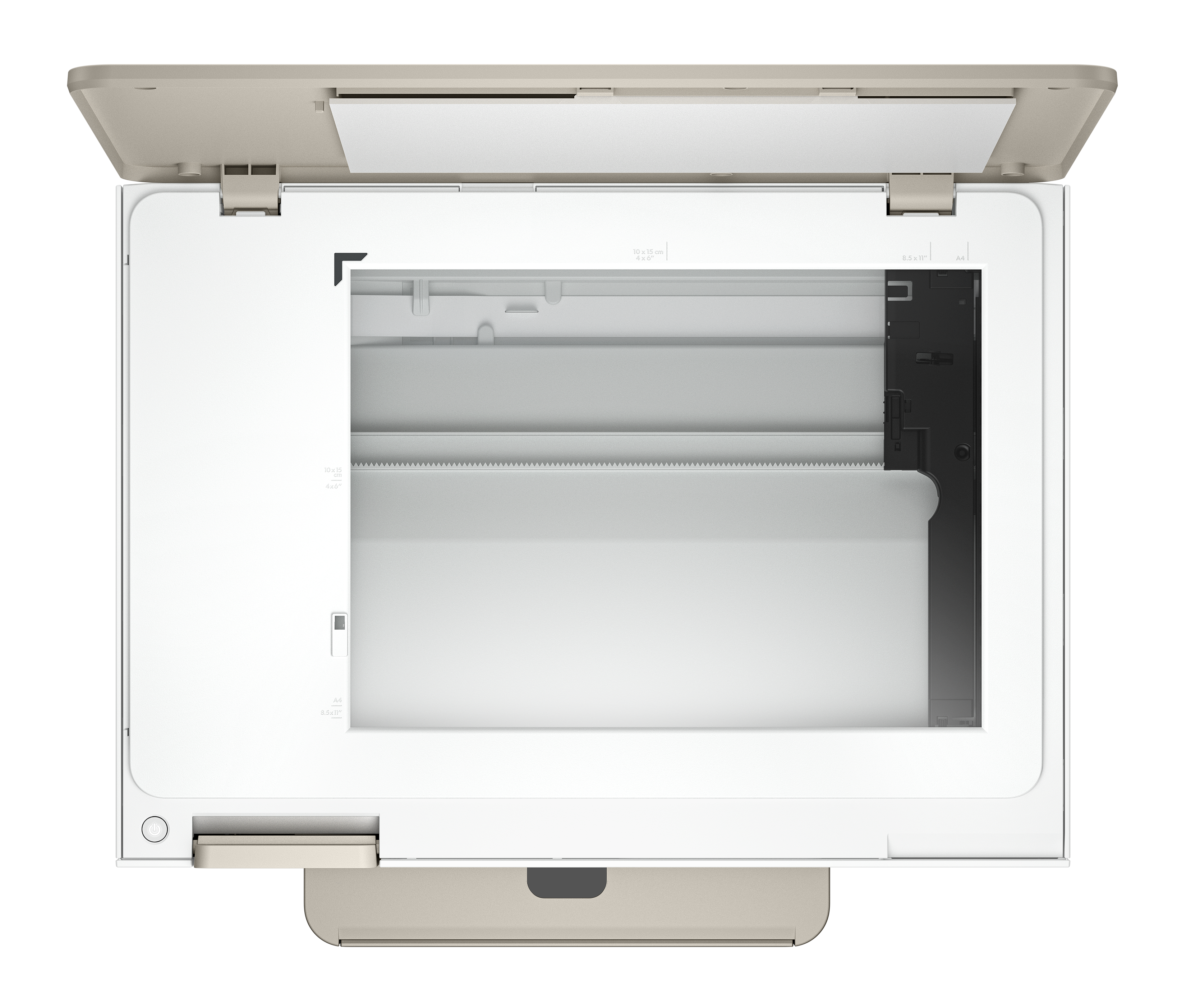 Widok z góry na drukarkę z otwartą pokrywą. Dominują kolory beżowy i biały. Widoczne jest łoże skanera, a design jest czysty.