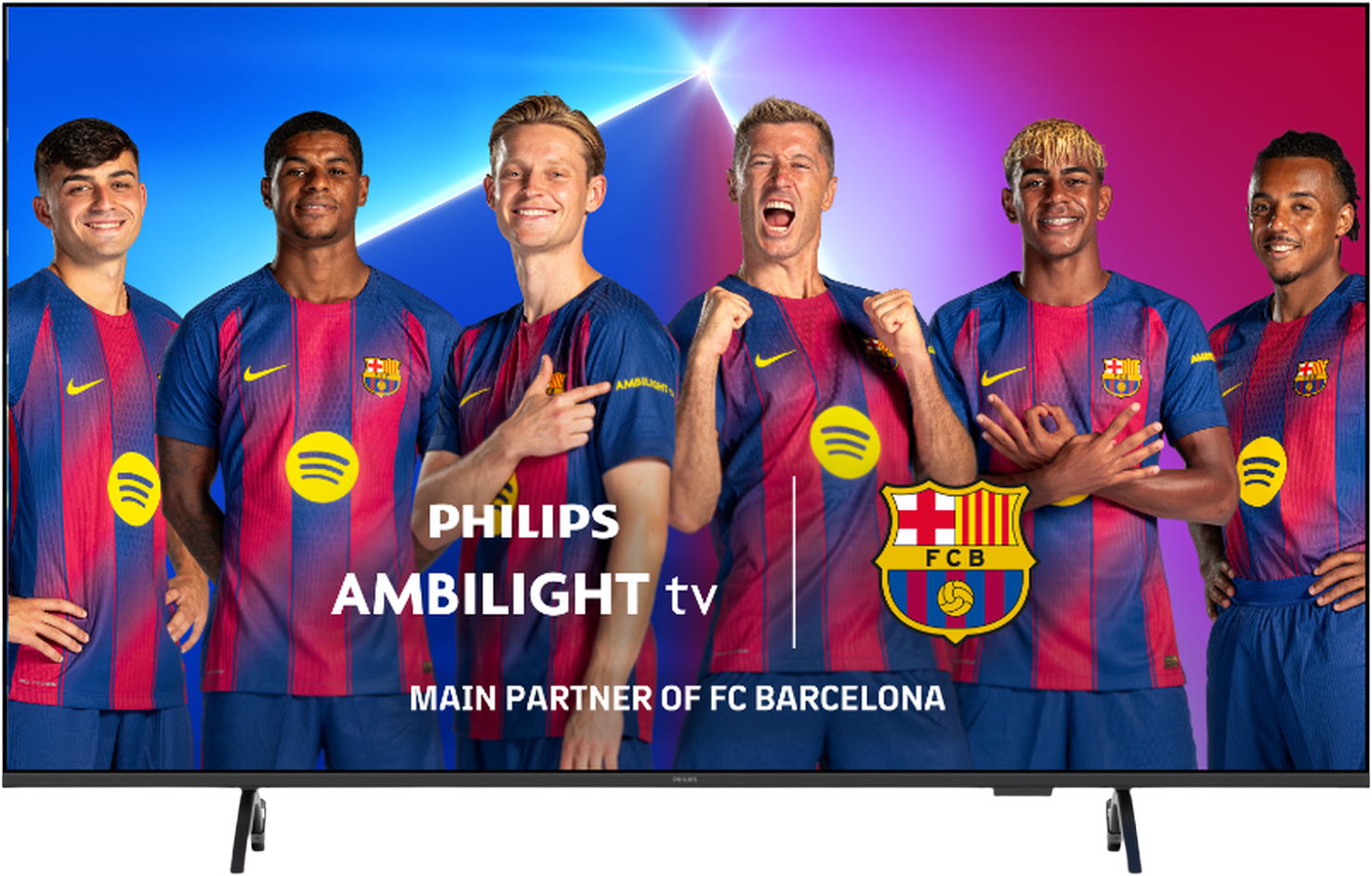 TV screen shows FC Barcelona players in jerseys. Logos include Spotify, Philips, and FCB. Blue and red colors dominate.