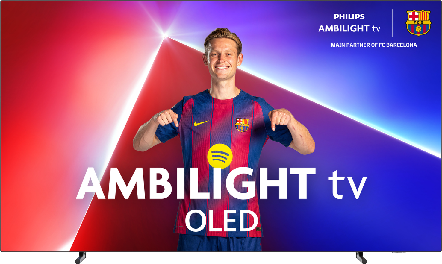 A man in a Barcelona jersey points down at the Ambilight TV OLED logo. Background is red and blue gradient.