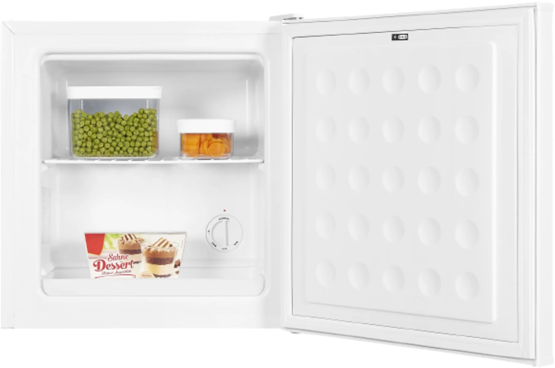 Congélateur blanc ouvert avec des contenants alimentaires. On voit des petits pois, des carottes et des tasses à dessert. La porte a un motif à points.