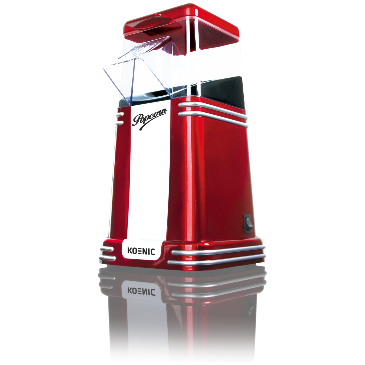 A red Koenic popcorn maker. It has a transparent top, a white panel with 'Popcorn' written on it, and silver accents. It stands on a white surface.