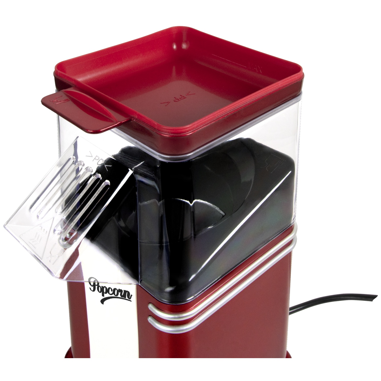 A red and clear popcorn maker. It has a red top and base, with a clear plastic container and a black interior.