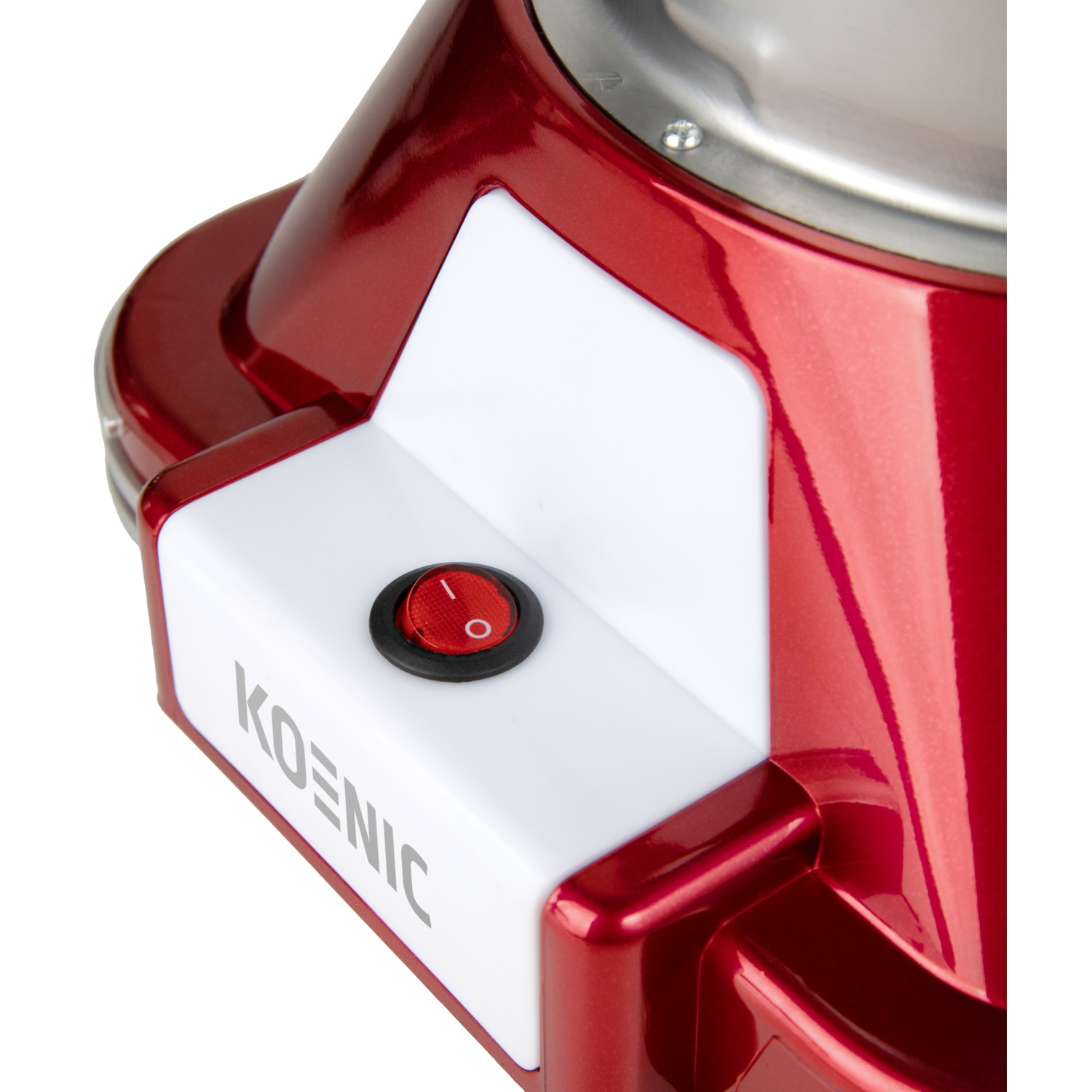 Close-up of a red and white machine. It has a red power button and the brand name 'KOENIC'. The top is silver.