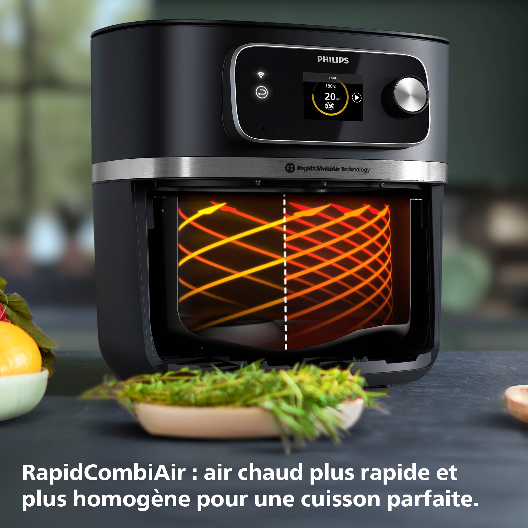 Friteuse à air Philips noire avec écran. Aliments et légumes dans des bols sur une surface sombre.
