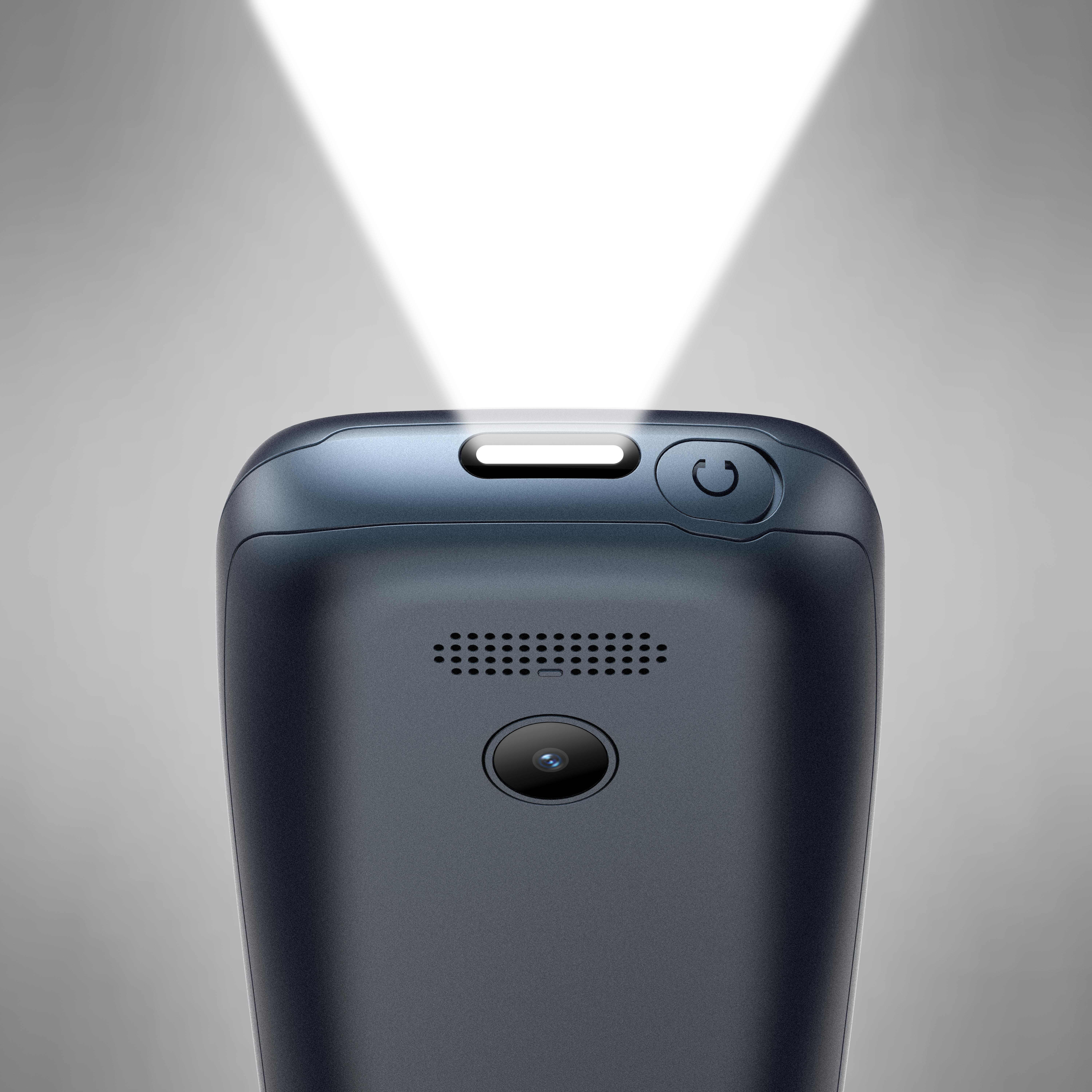 Nahaufnahme eines dunklen Telefons mit Taschenlampenstrahl. Das Telefon hat eine Kamera und einen Lautsprecher.