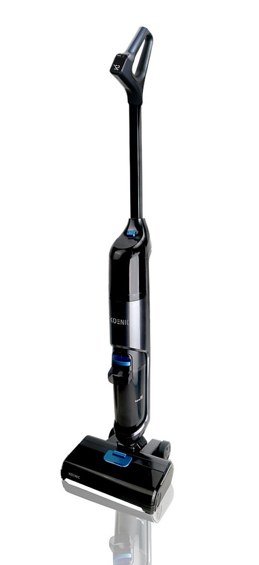 Czarny i srebrny odkurzacz Koenic stoi pionowo. Ma uchwyt, wyświetlacz cyfrowy i głowicę czyszczącą.