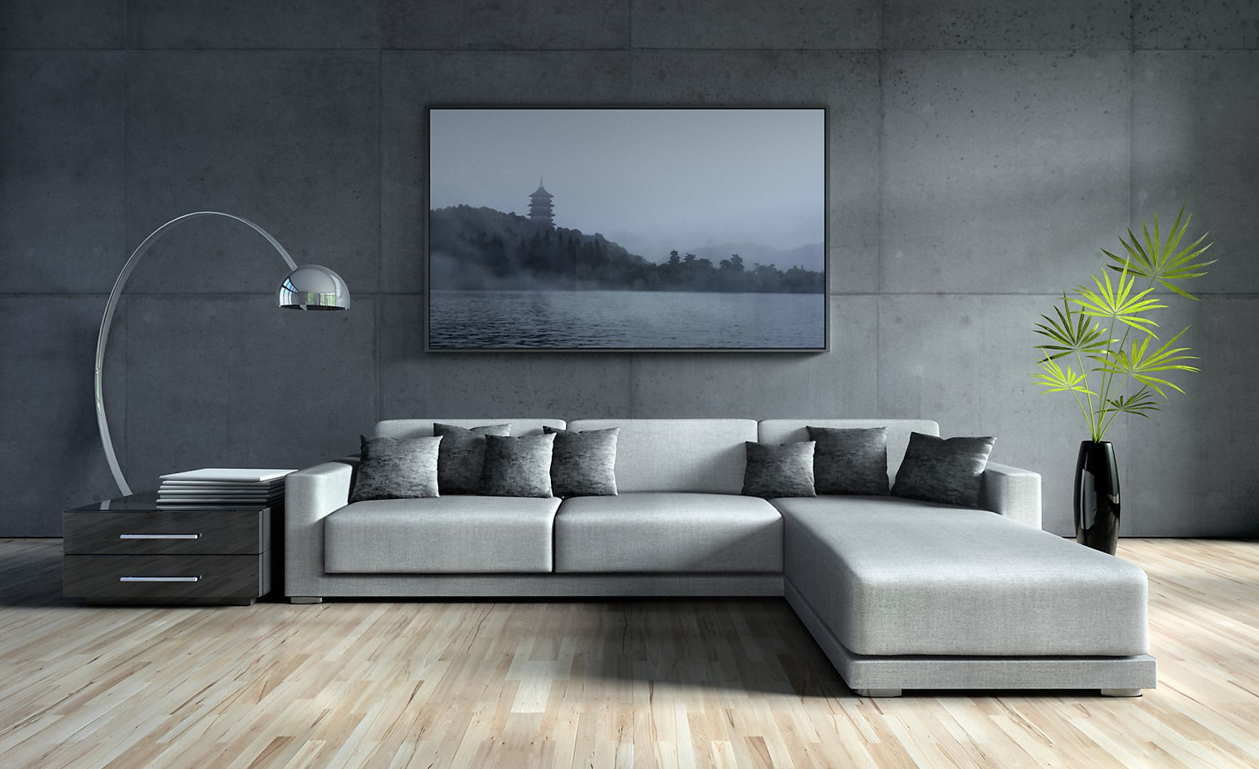 Salon z szarą sofą, obrazem jeziora, czarnym wazonem z zielonymi liśćmi, lampą i drewnianą podłogą.