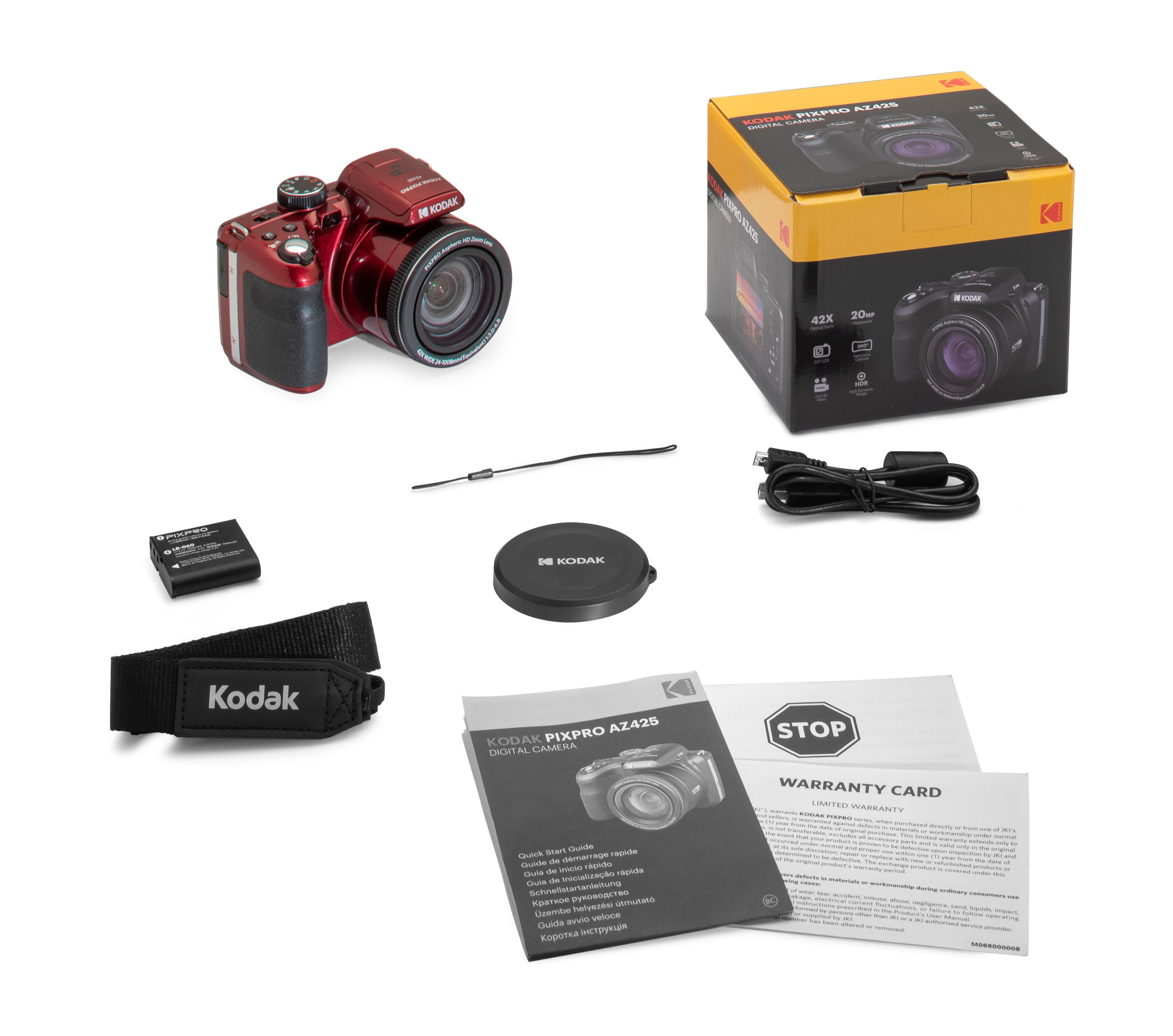 Kırmızı bir Kodak kamera, kutu, lens kapağı, kayış ve garanti kartı dahil aksesuarlarla.
