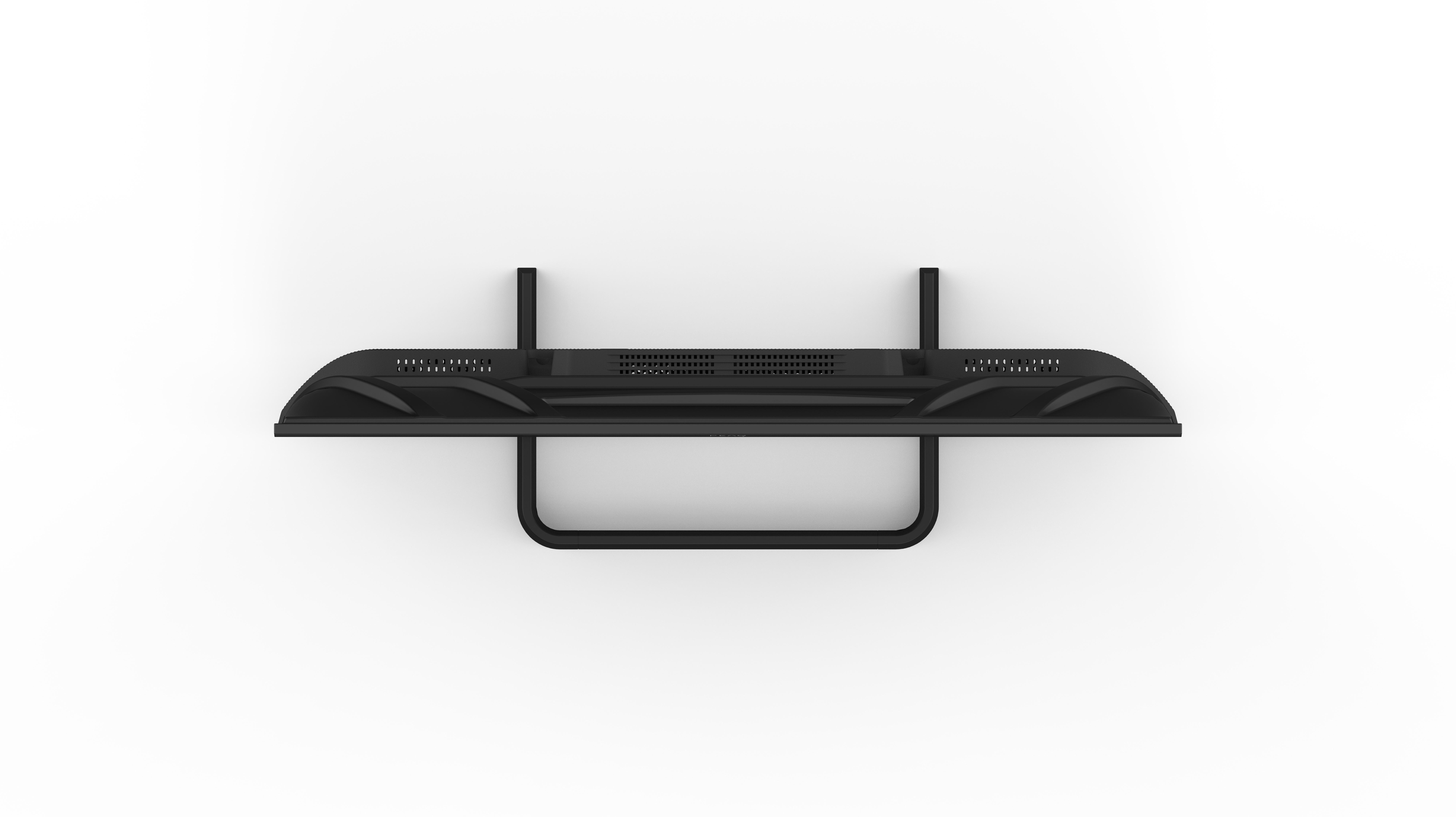 Draufsicht auf eine schwarze Aquarienabdeckung. Sie hat ein geschwungenes Design mit Lüftungsschlitzen und Lichtern. Es ist an einer weißen Wand montiert.