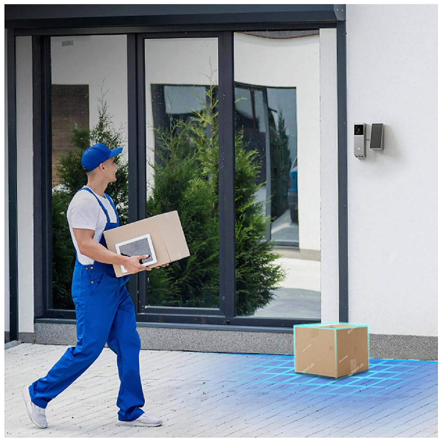 Delivery person in blue uniform carries package and tablet. A box sits on the ground with a blue grid around it. A door camera is on the wall.