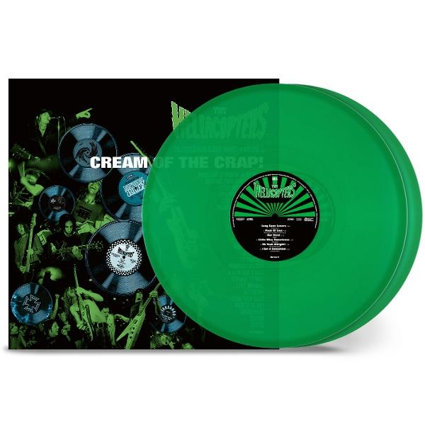Eine grüne Schallplatte mit schwarzem Label, neben einer Schallplattenhülle mit Bandmitgliedern und Albumtitel: Cream of the Crap!