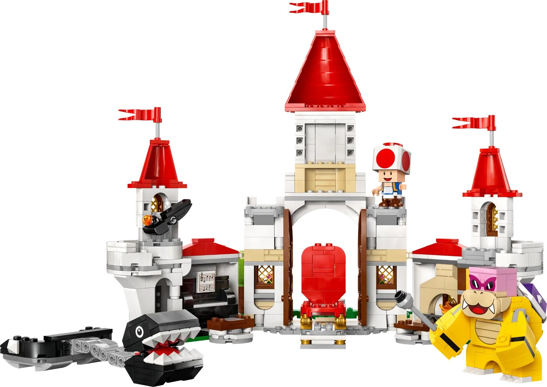 Zestaw Lego: zamek z wieżami z czerwonymi dachami, fortepianem, łańcuchem Chomp i postaciami Toad i Roy Koopa.