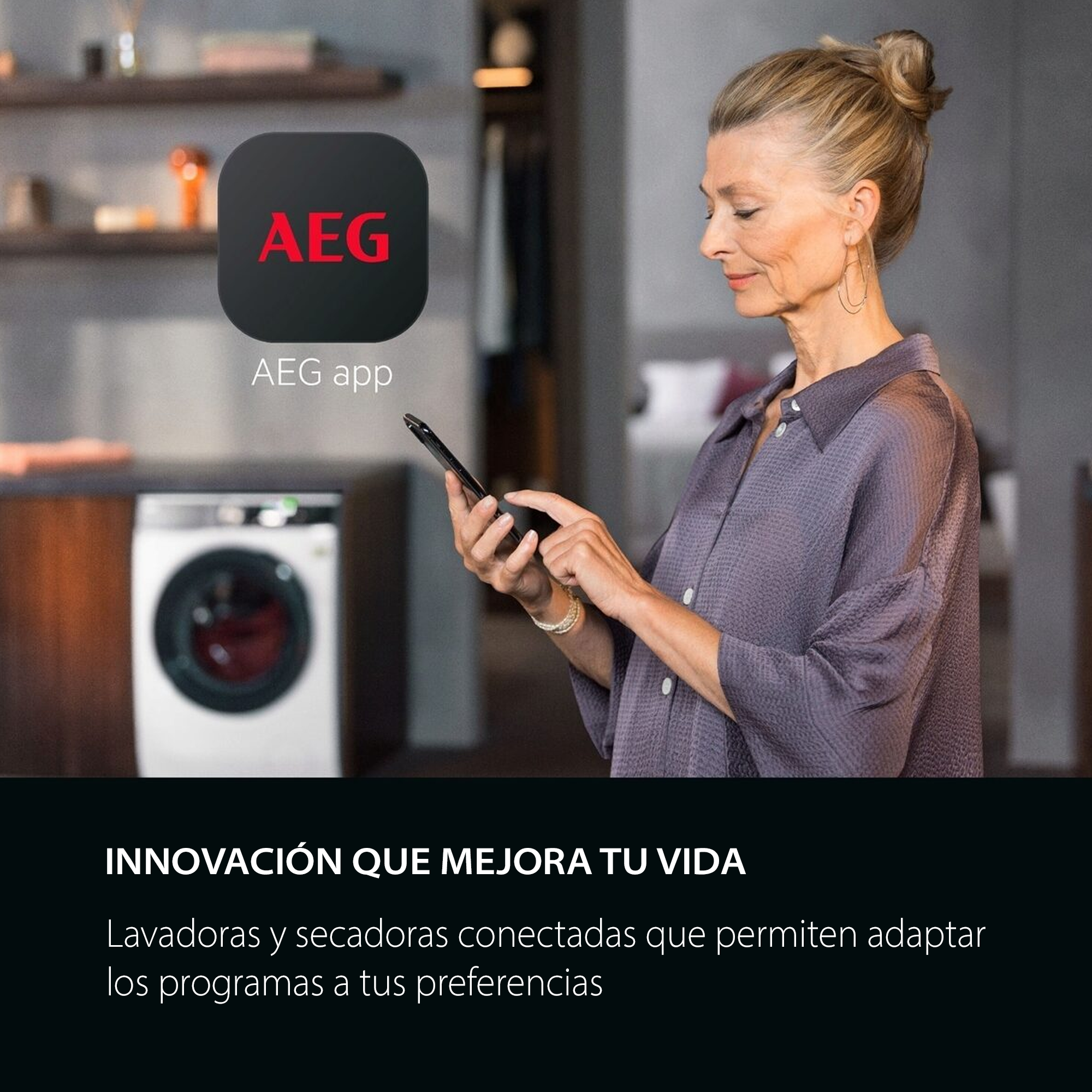 Mujer usando un teléfono junto a una lavadora AEG. El logotipo de la aplicación AEG está en el fondo. El texto dice 'Innovación que mejora tu vida'.