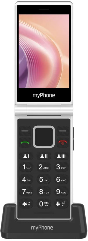 Biały telefon z klapką, otwarty, z ekranem wyświetlającym różowy wzór. Ma czarną klawiaturę i czarną podstawę.