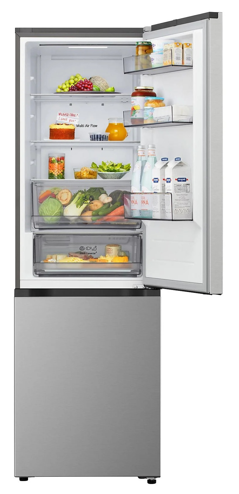 Otwarta lodówka wypełniona owocami, warzywami, napojami i ciastem. Drzwi są uchylone, ujawniając zawartość.