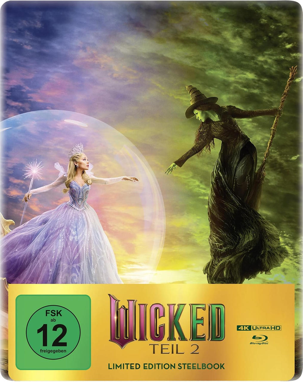 Cover-Art für Wicked Teil 2. Eine Frau in einer Blase steht einer grünen Hexe gegenüber. Der Hintergrund hat einen blauen und grünen Himmel.