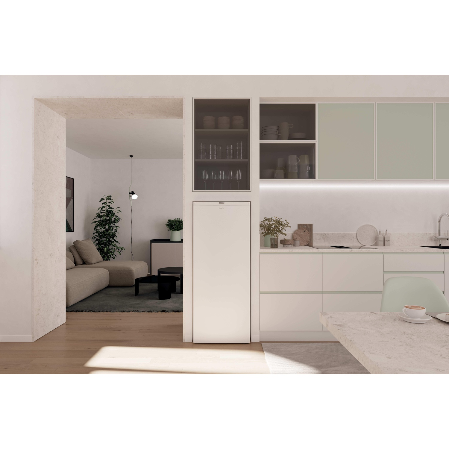 Una cucina moderna con frigorifero, armadi e tavolo bianchi. Un soggiorno con divano è visibile attraverso un'apertura.