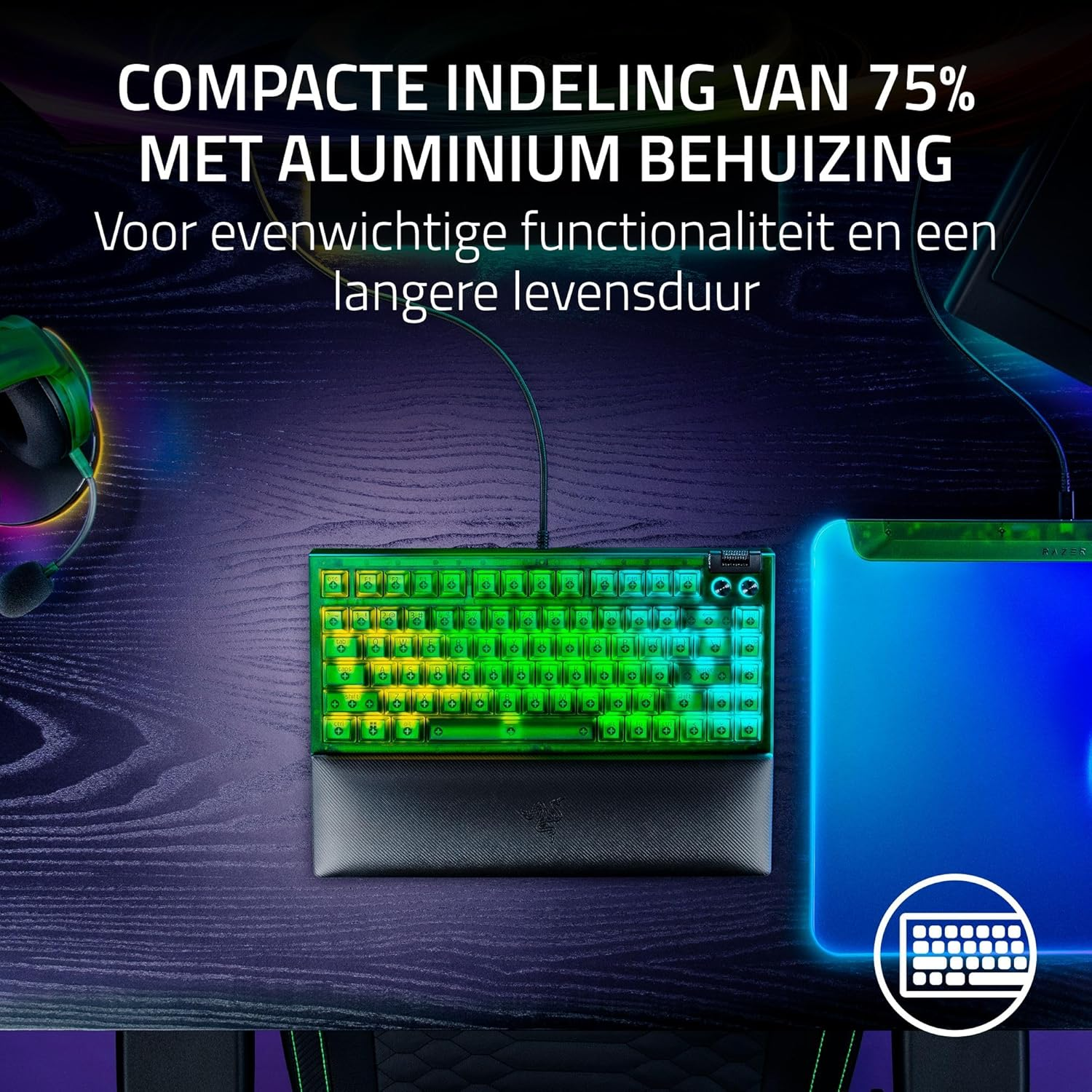 A lit-up keyboard with a wrist rest is on a wooden desk. A mousepad is to the right. Text above says 'compact layout'.