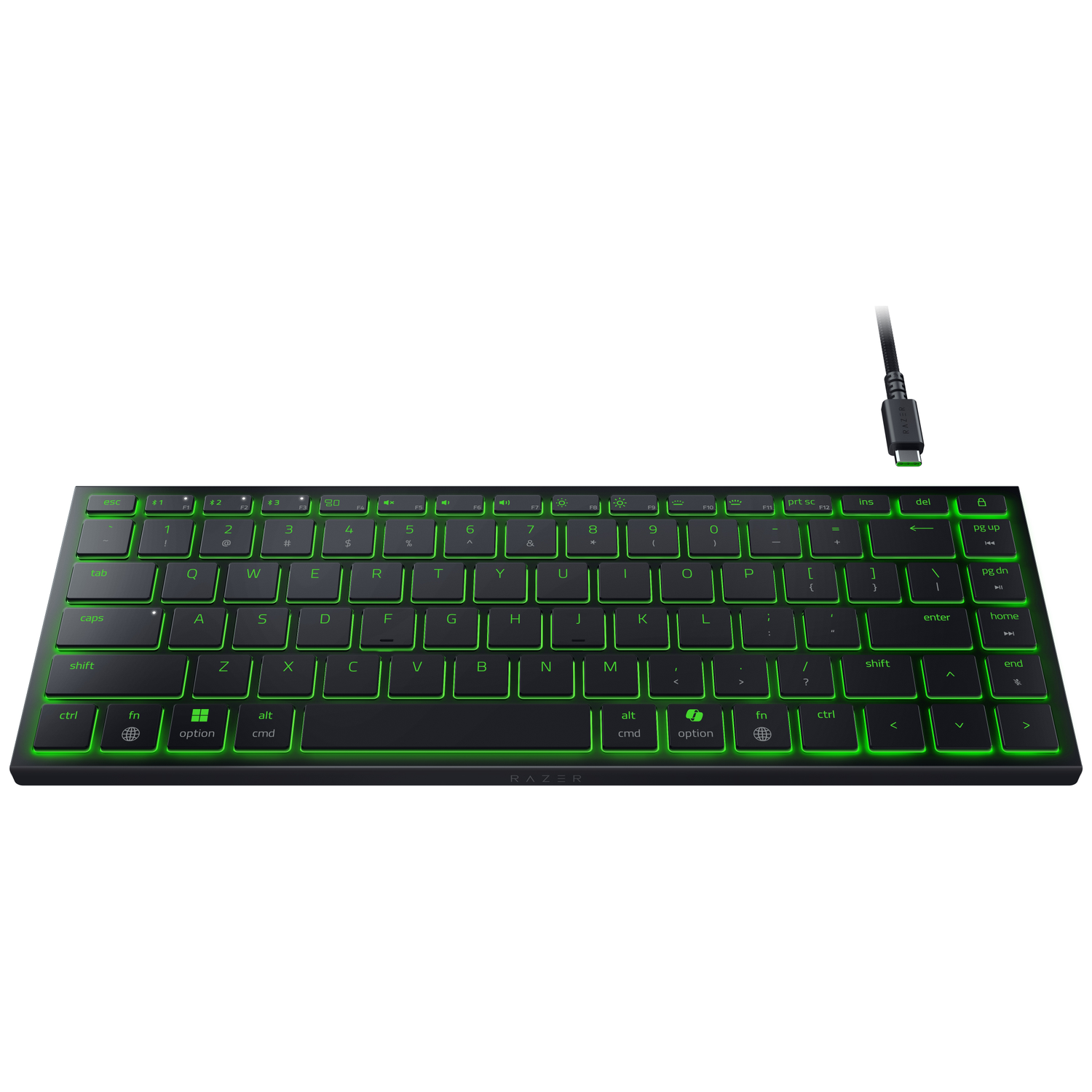 Black Razer keyboard with green backlit keys. A USB-C cable is connected. The keyboard is on a white background.