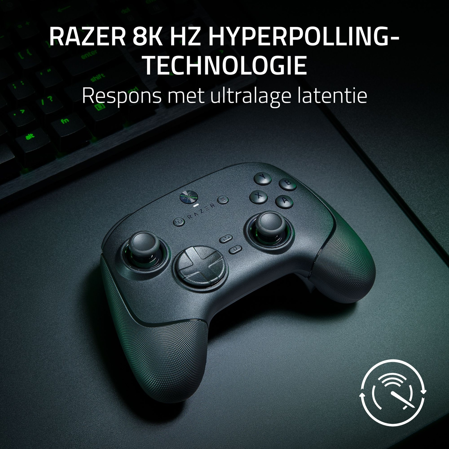 A black Razer gamepad on a dark surface. It has buttons, a D-pad, and joysticks. Keyboard is visible in the background.