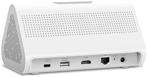 Weißes Gerät mit Anschlüssen, einschließlich USB, HDMI und LAN. Es hat eine dreieckige Form mit Lüftungslöchern und einem Stromanschluss.