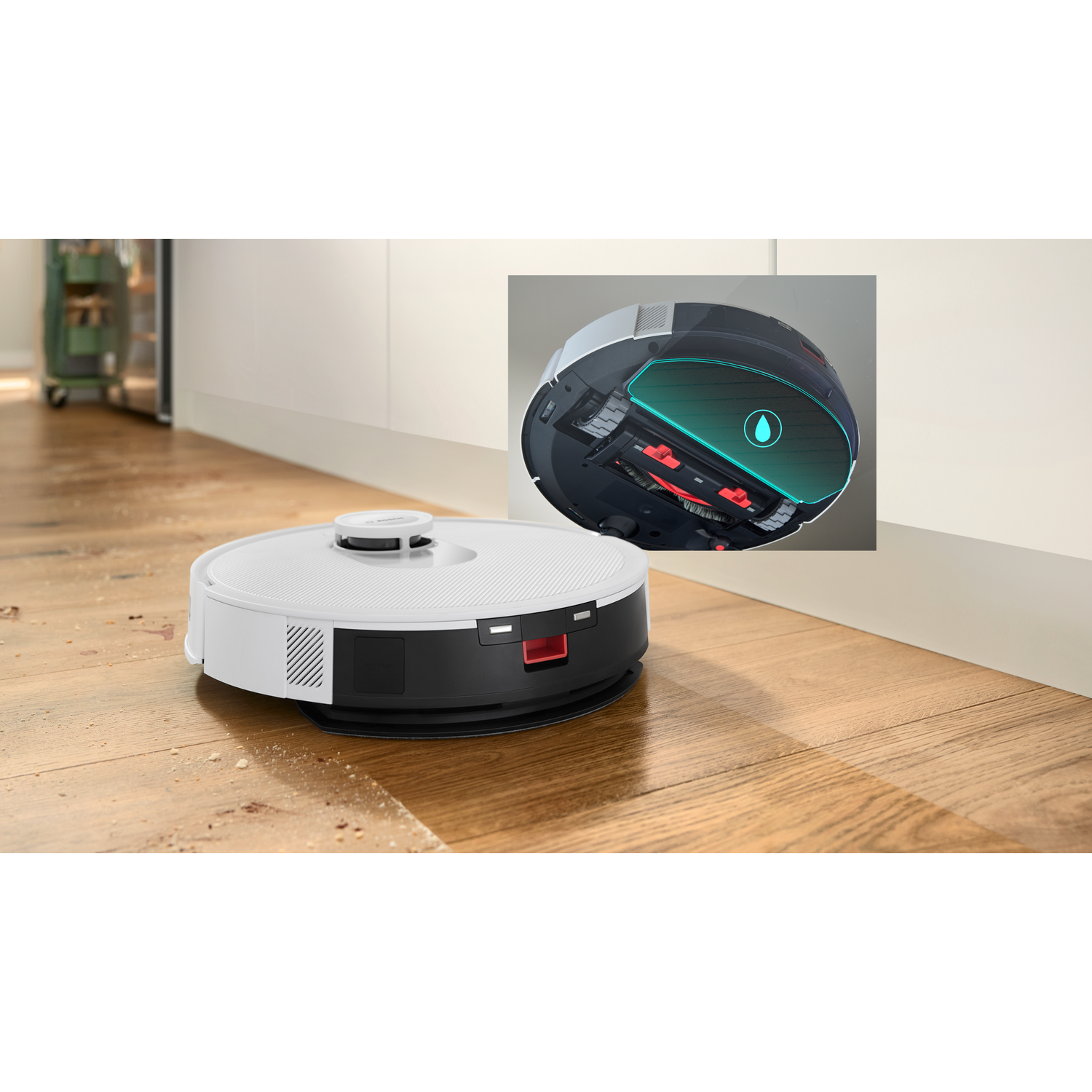 A white and black robot vacuum cleaner on a wooden floor. An inset shows internal parts, including a water tank.