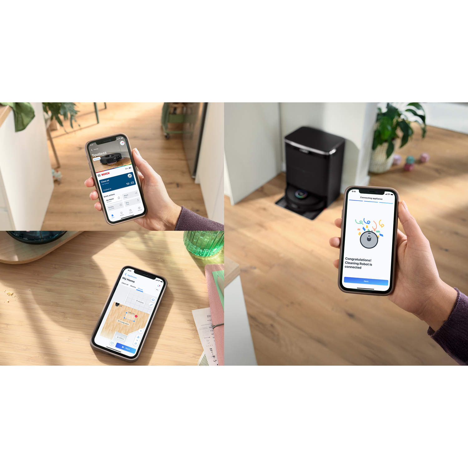 Hands holding phones display robot vacuum cleaner app. A robot vacuum and its docking station are in the background.