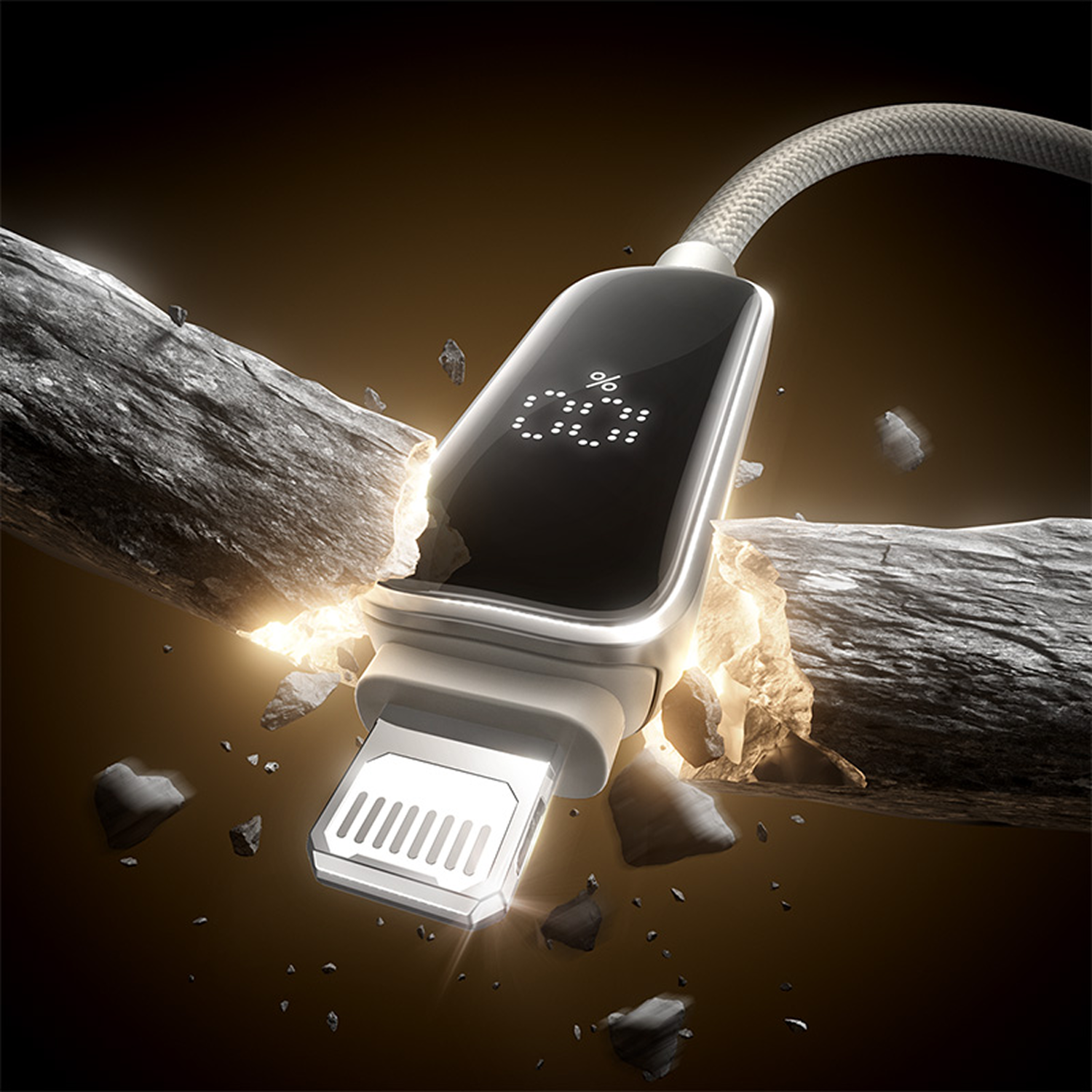 Un cable de carga con pantalla digital rompe una roca, mostrando un porcentaje. El fondo es marrón oscuro con fragmentos de roca.