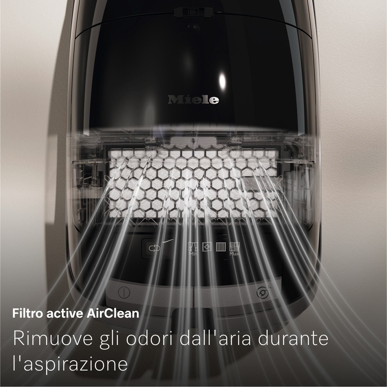 Primo piano di un aspirapolvere Miele nero con filtro. Linee trasparenti emanano dal filtro. Testo: 'Filtro active AirClean'.