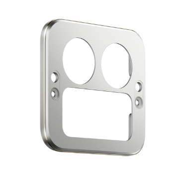 Srebrna metalowa płyta z dwoma okręgami i prostokątnym wycięciem. Małe otwory po bokach.