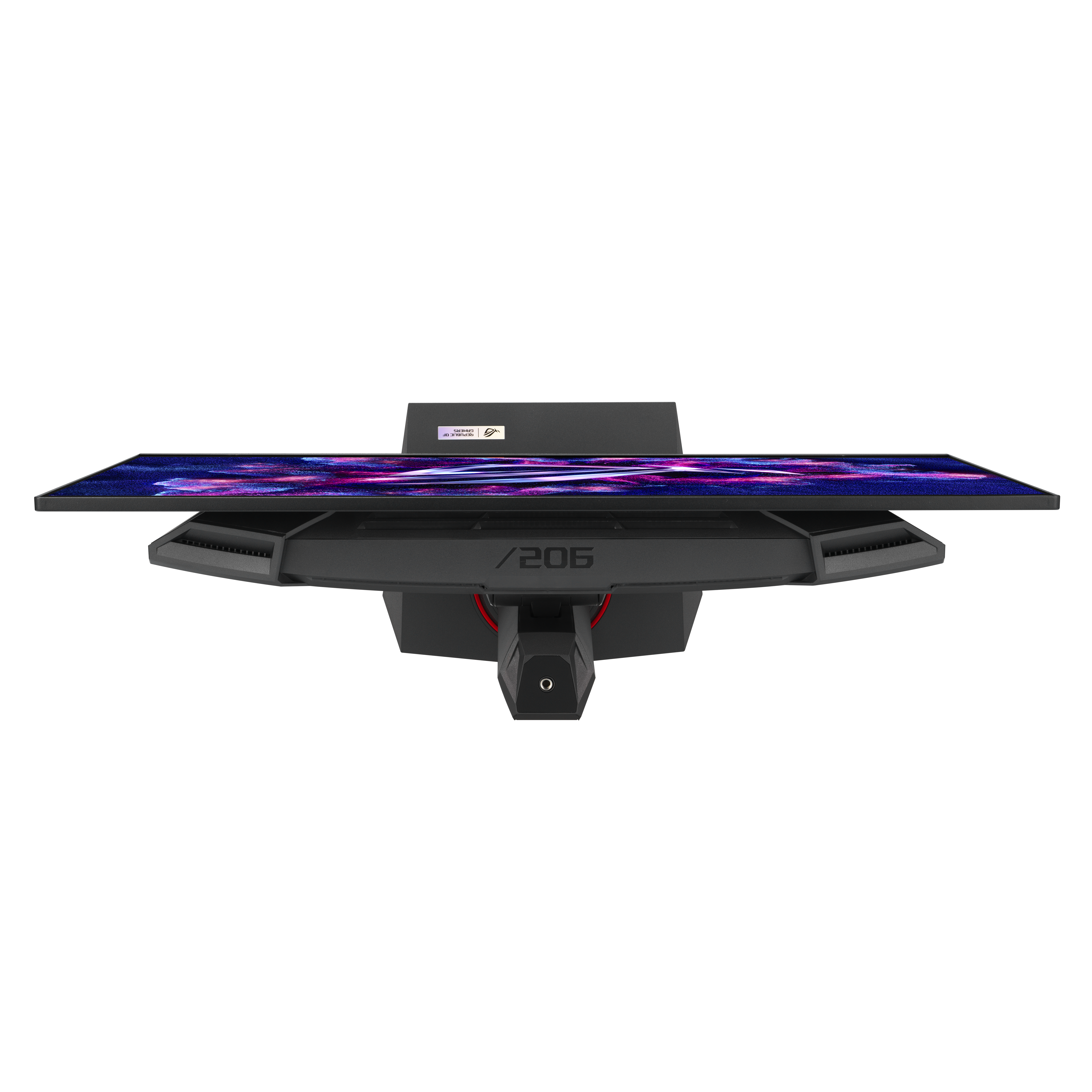 Widok z góry na czarny monitor komputera z ciemnym tłem. Ekran wyświetla kolorowy wzór cyfrowy.