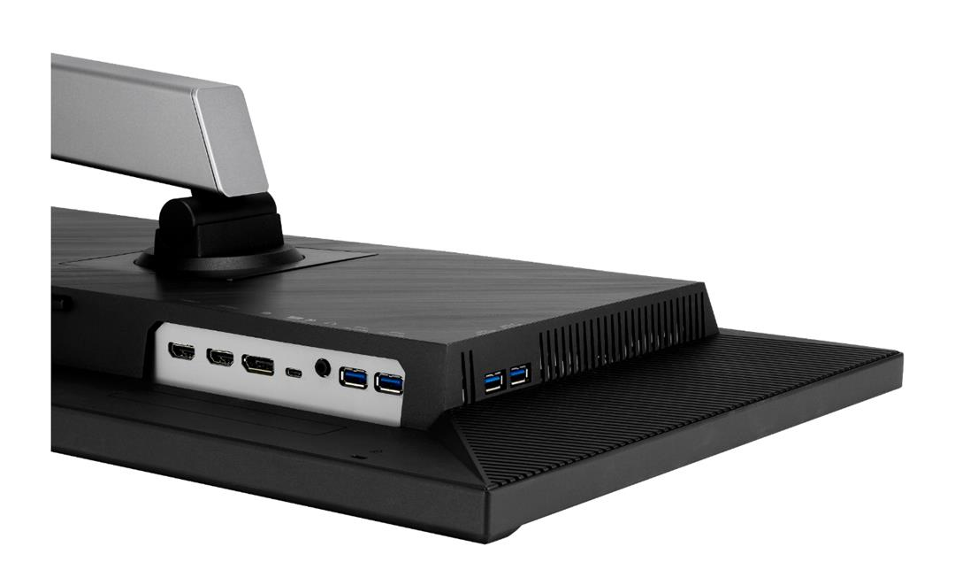 Zbliżenie tyłu monitora komputerowego. Posiada wiele portów, srebrny stojak i czarną, teksturowaną powierzchnię.