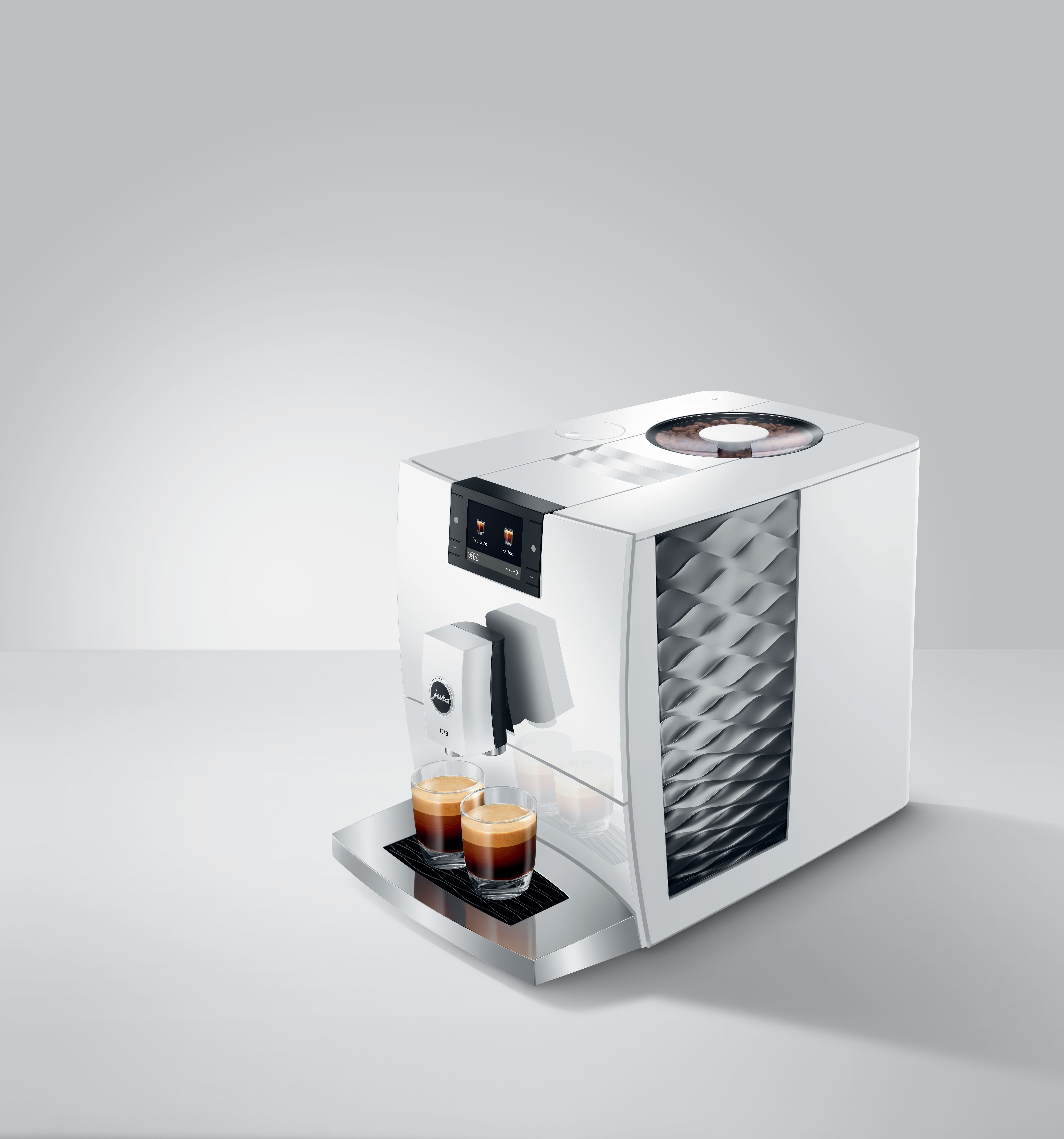 Eine weiße Kaffeemaschine mit zwei Espressos in Gläsern. Die Maschine hat ein digitales Display und einen Bohnenbehälter.