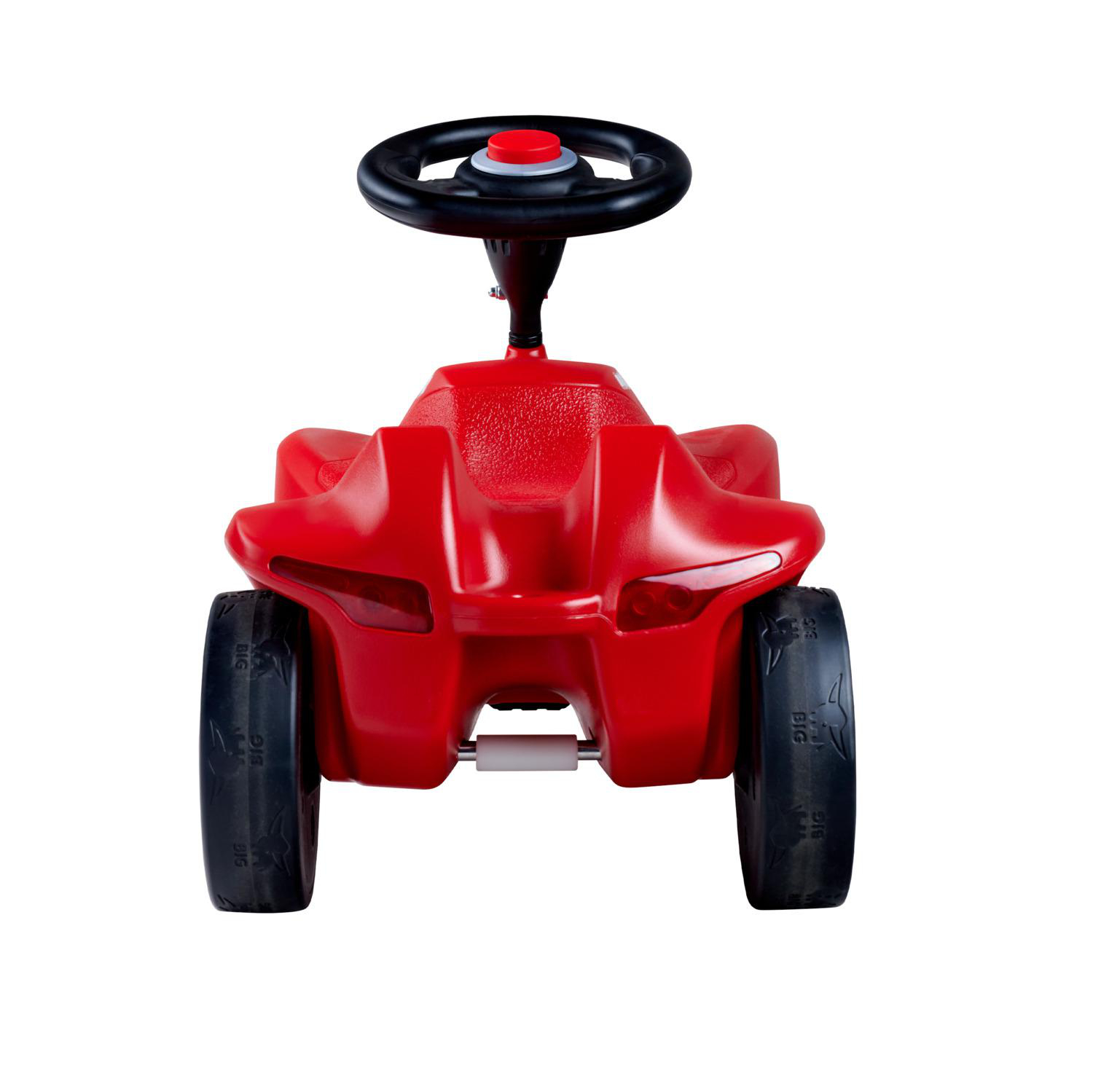 Ein rotes Spielzeugauto mit schwarzen Reifen und Lenkrad. Das Auto hat das Wort 'BIG' auf den Reifen.