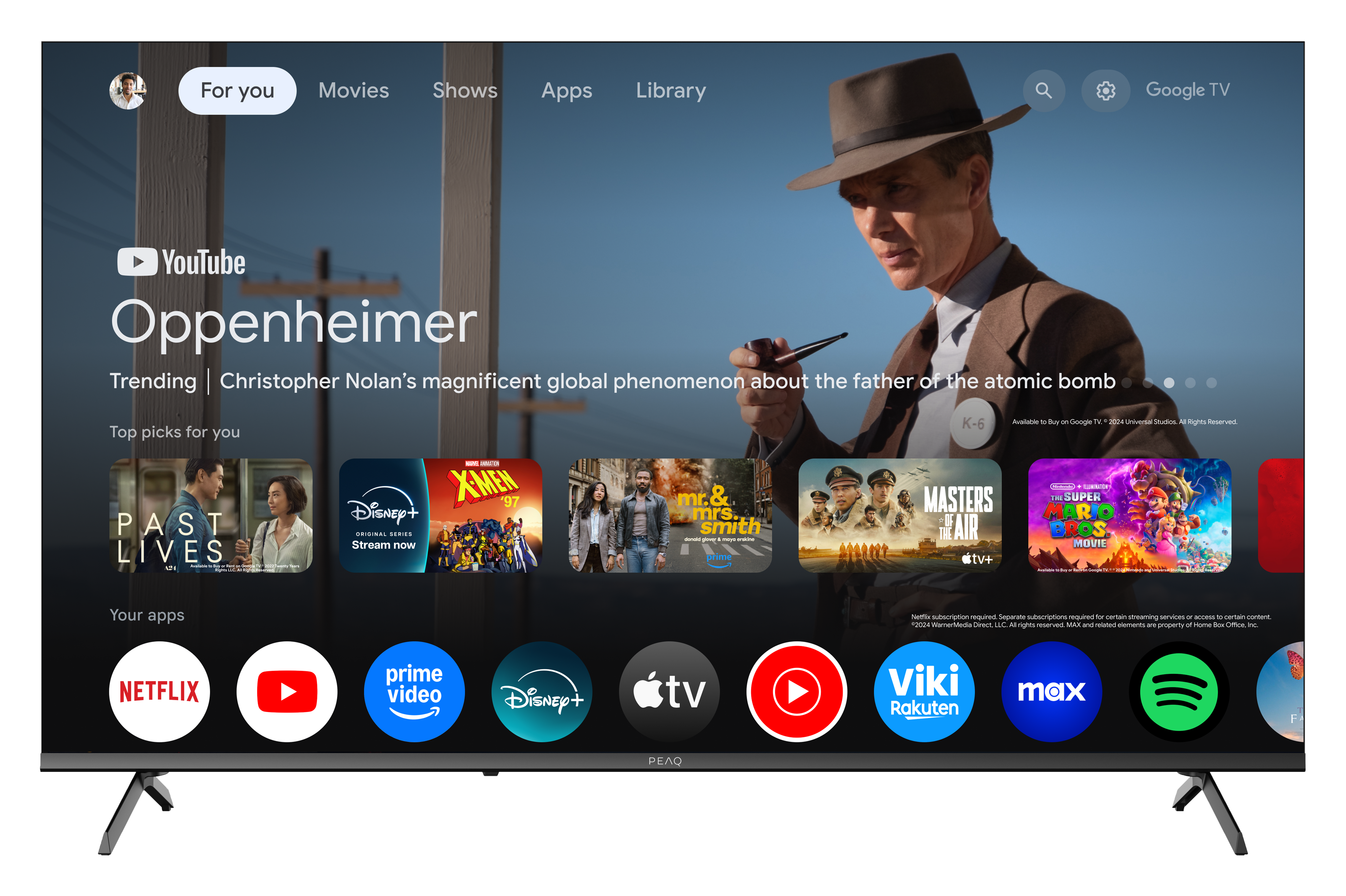 Ekran telewizora wyświetla interfejs YouTube z 'Oppenheimer' i ikonami aplikacji dla Netflix, YouTube, Prime Video i Disney+.