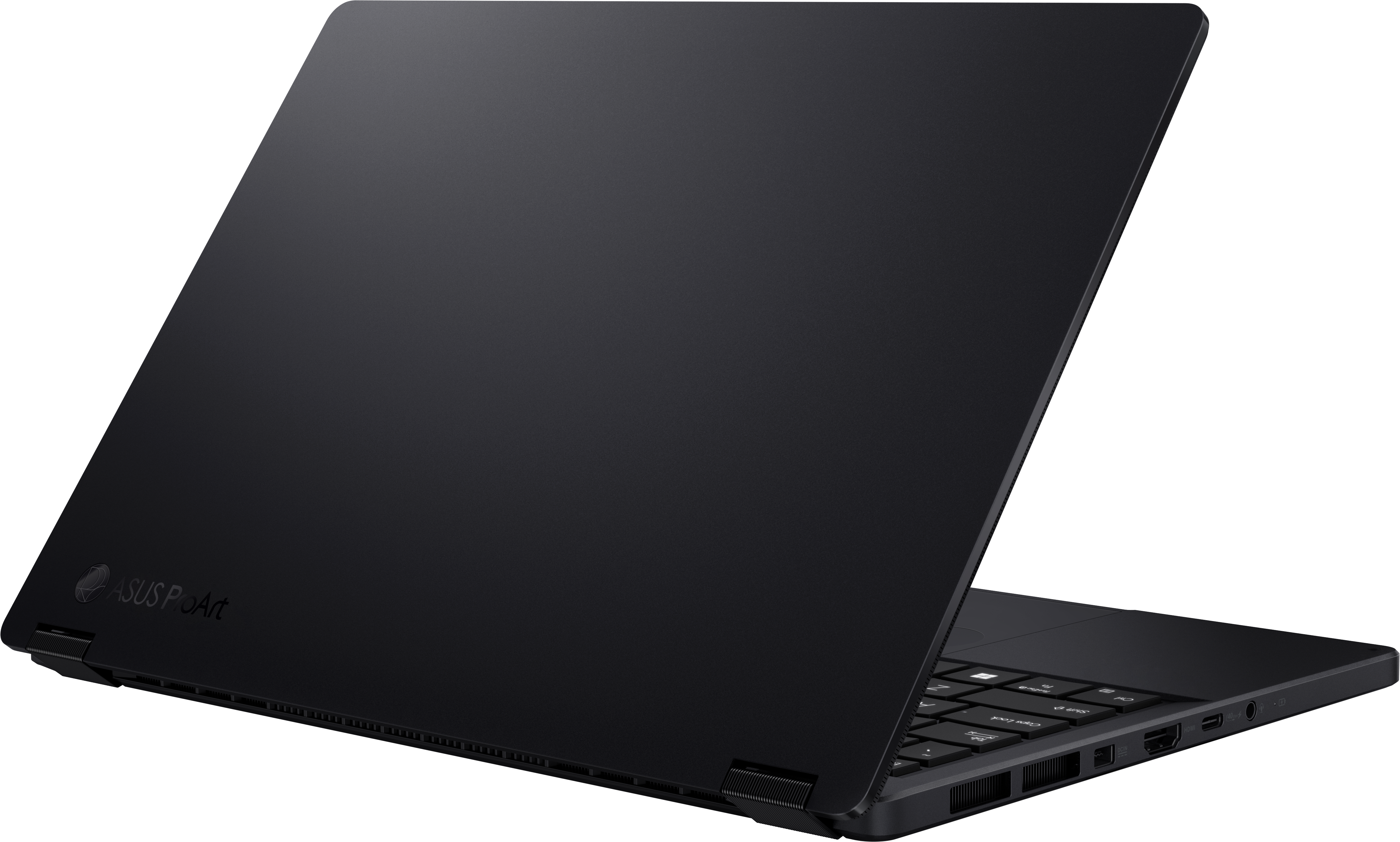 Ordinateur portable ASUS ProArt noir sur fond blanc. Partiellement ouvert, clavier et ports visibles.