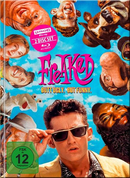 DVD-Cover. Gesichter von Menschen um den Titel 'Freaked'. Ein Mann mit Sonnenbrille, die Zahl 12 und blauer Himmel sind sichtbar.