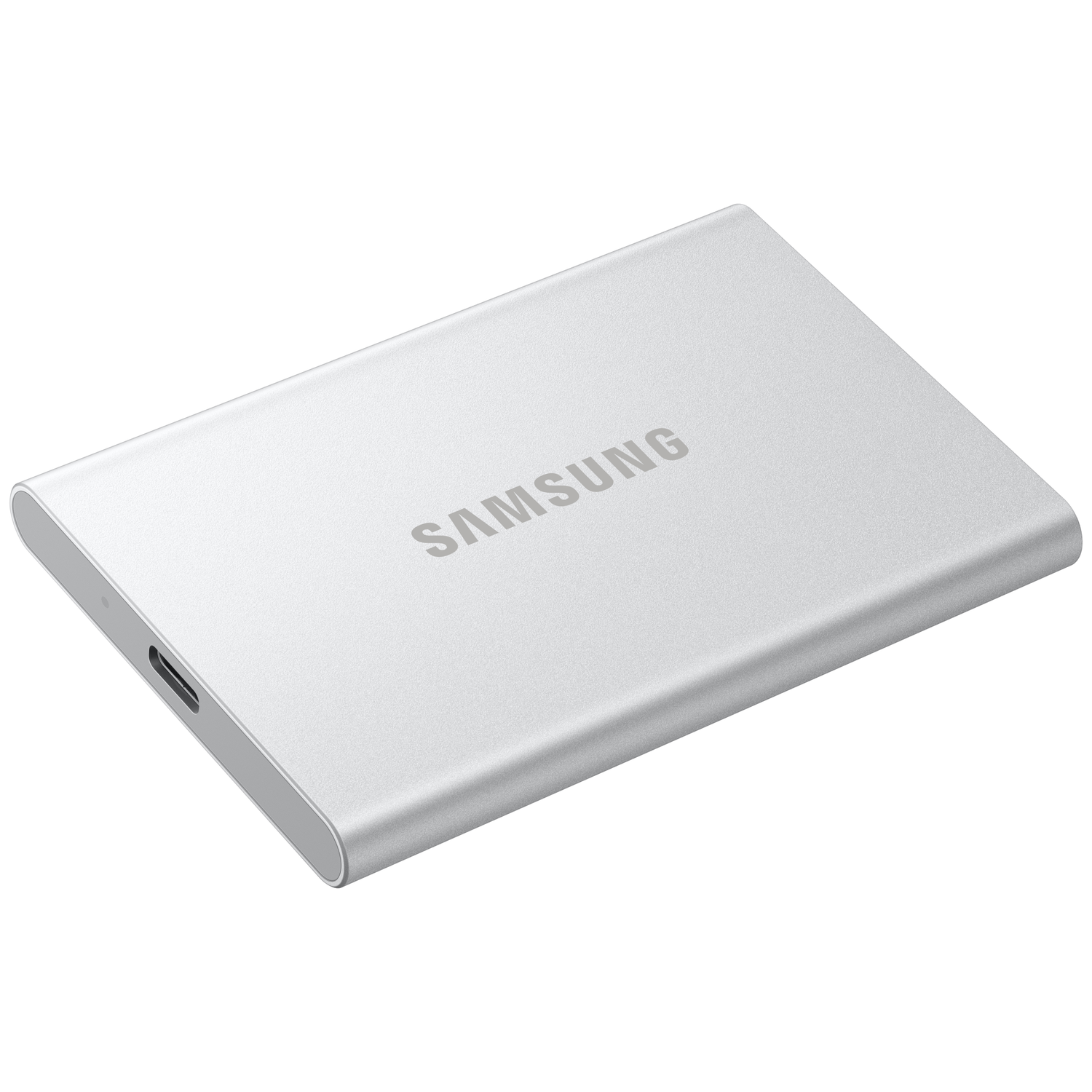 A silver Samsung portable SSD on a white background. The drive is rectangular with the brand name printed on it.