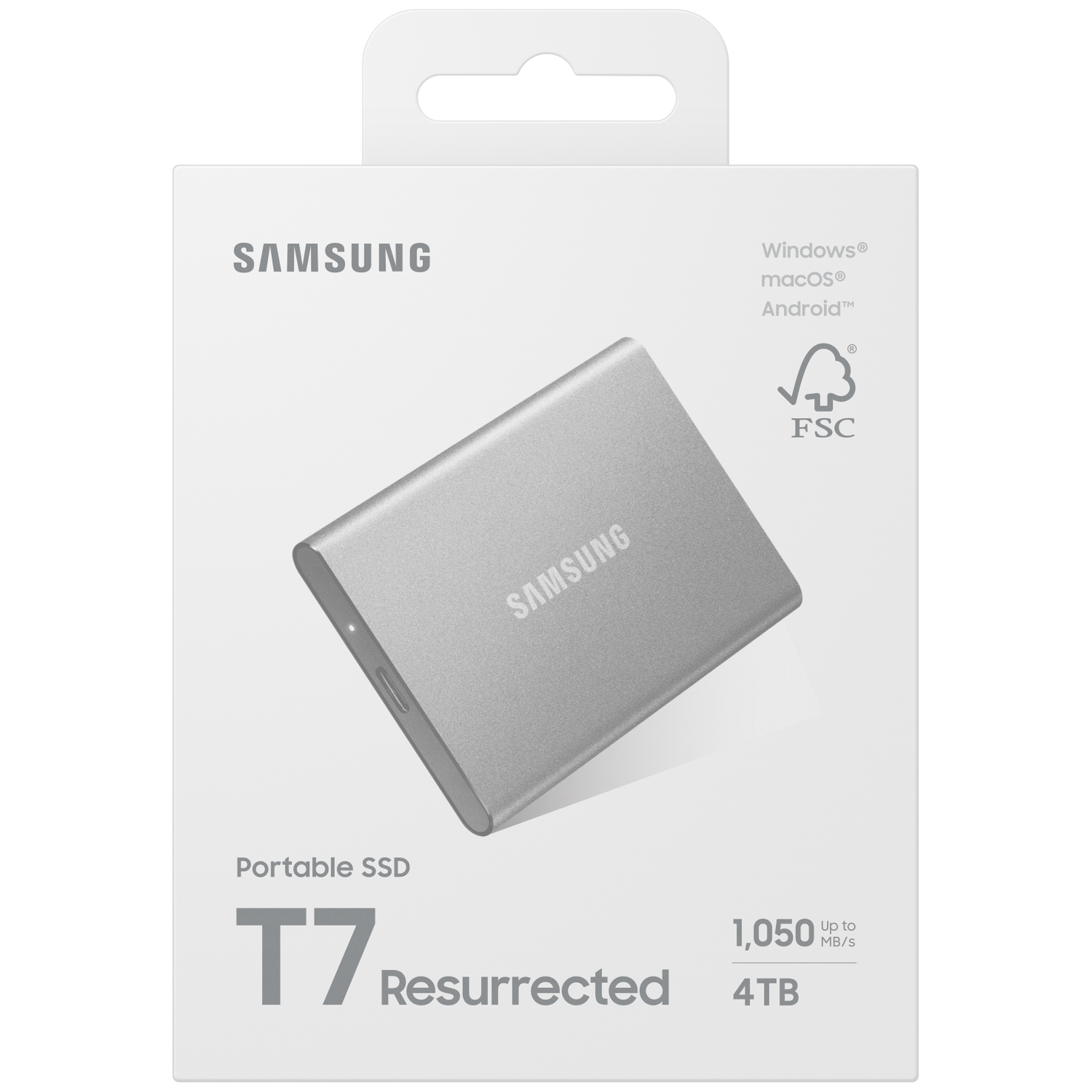 A silver Samsung T7 Portable SSD on a white box. The box has the Samsung logo, Windows, macOS, and Android logos, and FSC logo.
