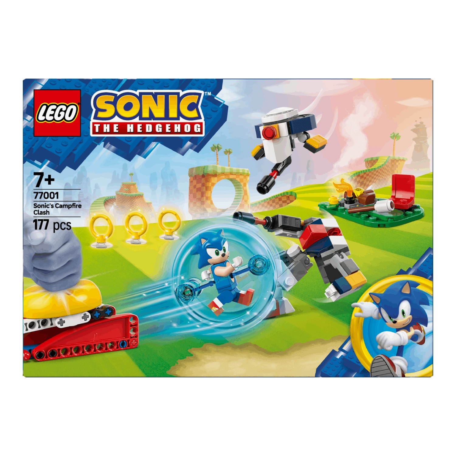Lego Sonic set. Sonic figuur rent, robot vijanden, ringen, kampvuur en een achtergrond met heuvels en een blauwe lucht.