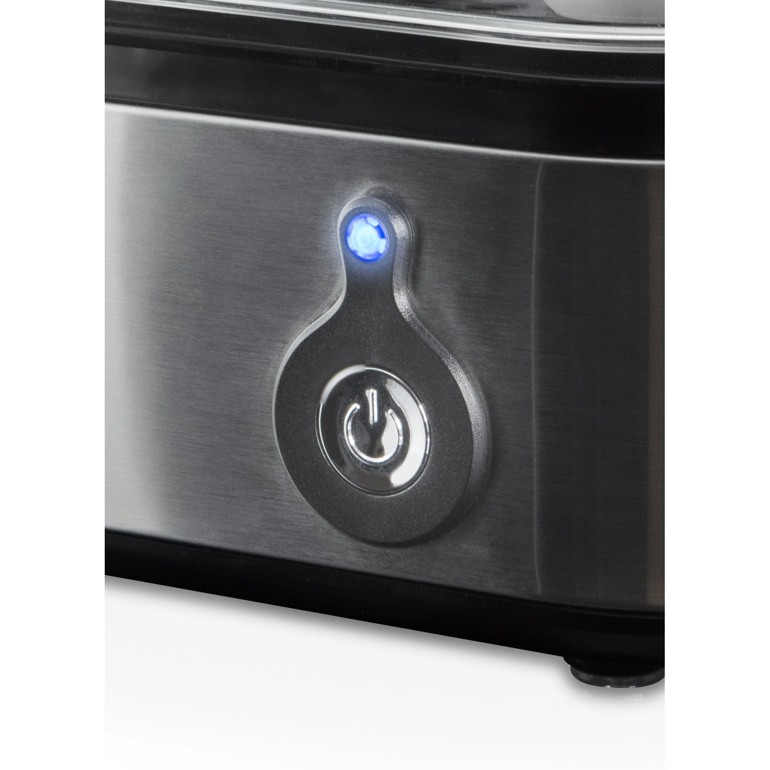 Close-up of a stainless steel appliance with a power button and a blue light. The button is lit, indicating the device is on.