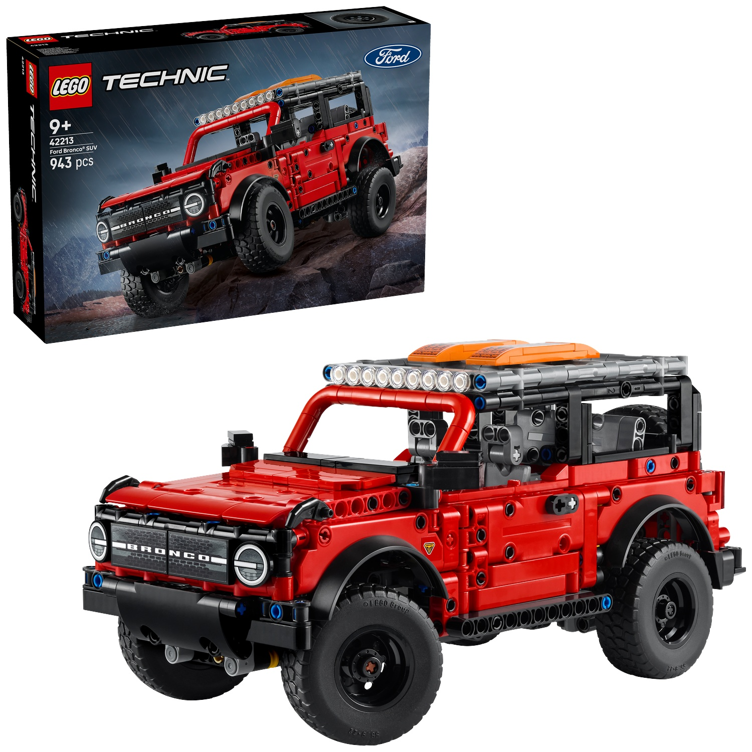 A red Lego Technic Ford Bronco SUV model with black tires and details, and a box with the model on it.
