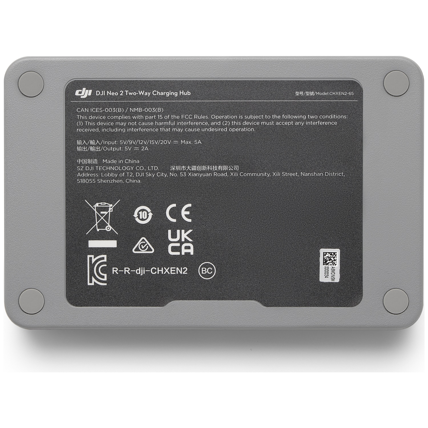 Gray DJI Neo 2 charging hub. Text includes model info, input/output specs, and manufacturer details.