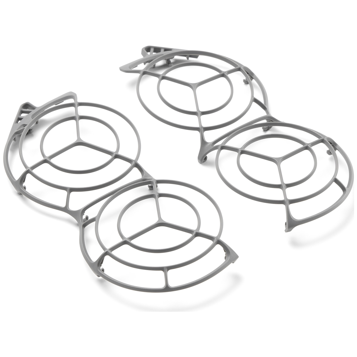 Deux grilles circulaires en plastique gris sur fond blanc. Chacune a un support central et des bords extérieurs incurvés.