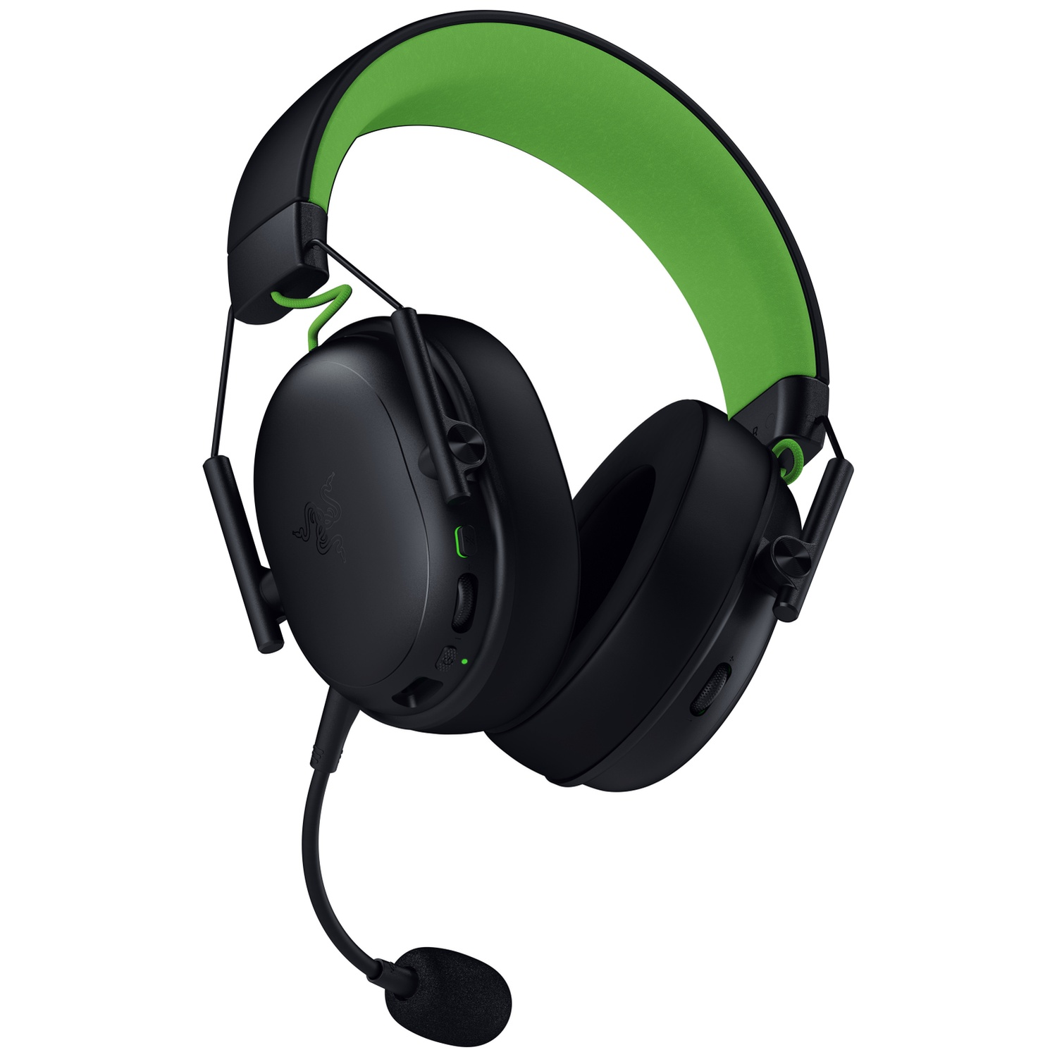 Black Razer gaming headset with green accents. The headband is green, earcups black. A microphone extends from the left earcup.
