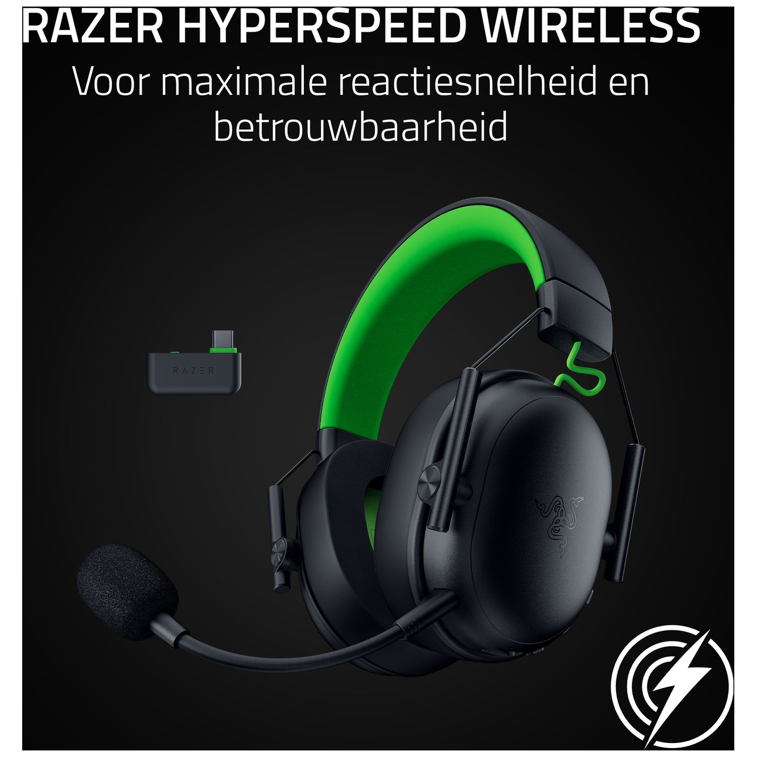 Black Razer wireless headset with green accents. Includes a microphone and a small transmitter. The background is black.